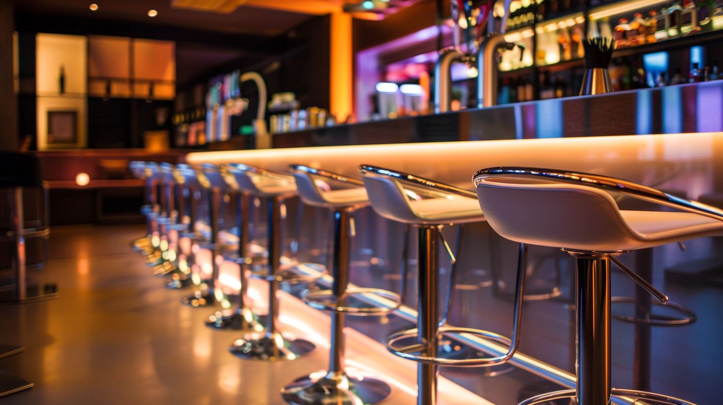 Elegant event space filled with modern bar stools.